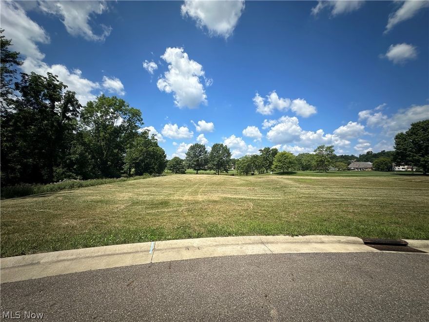 FINAL PHASE! CHECK IT OUT!! Whether you are interested in the deep history of this amazing 381 acre private Country Club and amazing neighborhood or just looking for a convenient lifestyle with all the bells and whistles, you have found your place!  This amazing building lot nestled on a dead end street overlooking the 14th hole and is just one of a limited number of lots still remaining.  Bring your builder and build your future home in the heart of luxury in this exclusive gated community.  Nestled amidst lush, meticulously landscaped grounds, this vacant lot offers the perfect canvas for your dream residence.  Each lot boast breathtaking views and us surrounded by a world-class Jack Nicklaus designed signature golf course where rolling greens and serene water features provide a picturesque back drop.  This community is designed for  those who appreciate the finer things in life.  Residents enjoy unparalleled amenities including a state of the art fitness center, kids club, an amazing pool, tennis and pickleball courts and so much more.  The elegant clubhouse serves as a social hub, featuring multiple gourmet dining options, a luxurious health spa and a calendar full of events and activities.  Well being and privacy are paramount in our gated enclave, ensuring a tranquil living environment.  Seize this rare opportunity to build your custom home in a setting that combines natural beauty, modern conveniences and an active vibrant community.  Welcome to a life of sophistication and leisure.  Welcome to Glenmoor!!  EXTRA EXTRA!!  When you purchase this lot you receive 1.  a full golf membership initiation fee 2. One year full golf membership 3. One full year of HOA dues 4. Choice of NEW men or woman New Drivers (golf club) or putter 5. One case of golf balls and 6. 12 - golf guest passes for 18 holes.