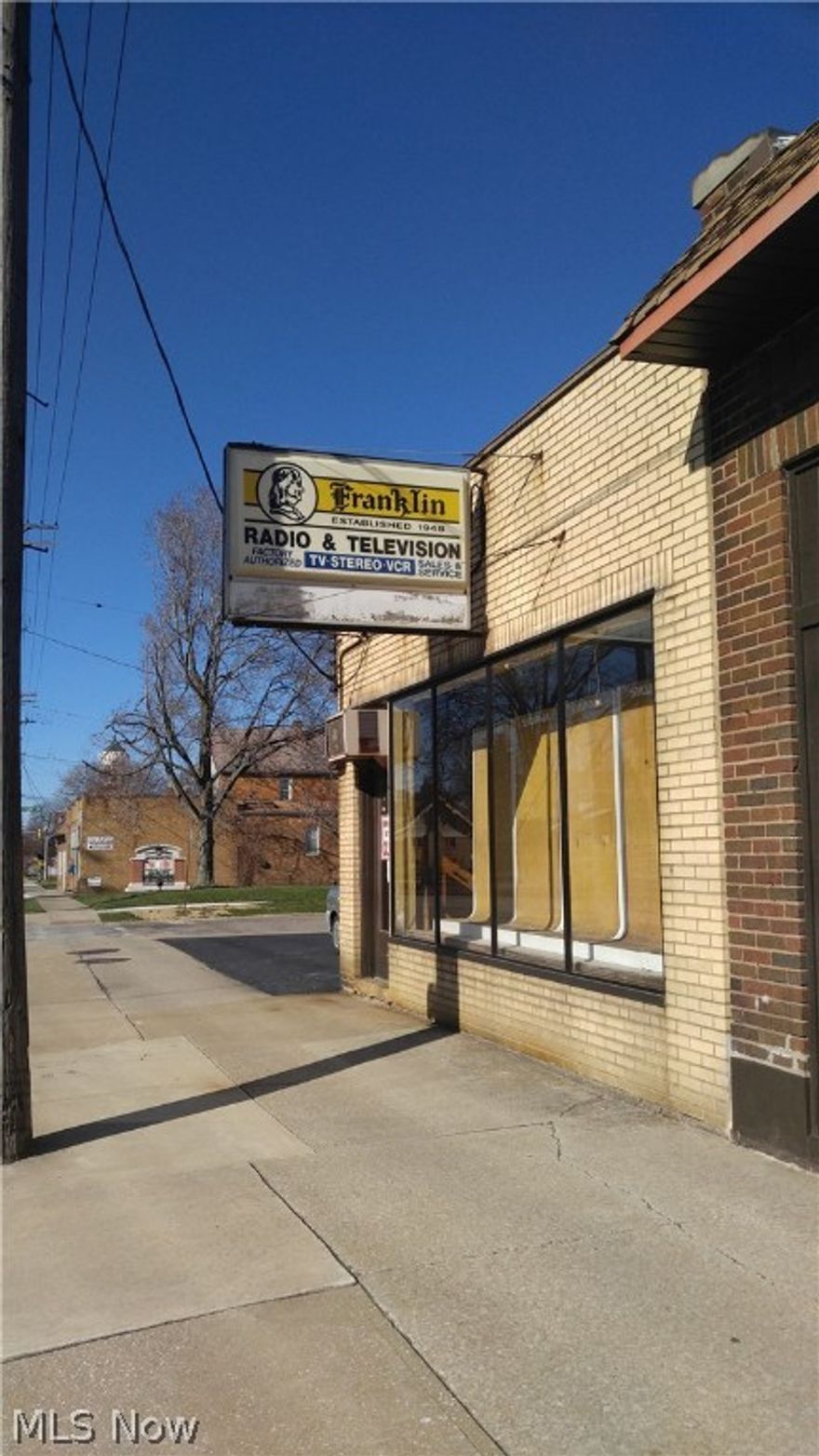 Buy a piece of Parma history. The former Franklin TV building has been a staple in Parma since the 1940's. This free standing building is approximately 3,000 sq ft and it sits on approximately 11,000 sq ft of land. The building has ample parking and has the land available for additional parking or a building addition as the grass lot behind the building is included in the sale. This building is a blank slate and ready for economic development. Has area for retail as well as warehouse storage in the back. Priced to sell. Motivated seller, bring offers.