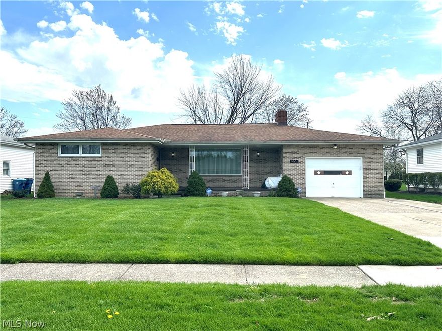 Gorgeous ranch located on a well maintained lot in a lovely neighborhood where you are immediately smitten by the stately brick front and large front porch. As you tour this lovely home, you'll note the raised hearth brick fireplace is a fantastic focal point in the huge welcoming great room. You'll appreciate the decorative tray ceiling. The bright eat-in kitchen comes fully applianced. You'll love all the cabinet space, plus there are two pantries! A cozy den overlooks the backyard and is a terrific space for your home office or a tv/video game room for the kids. The main bedroom boasts 3 closets that should certainly accommodate your wardrobe needs! The additional bedrooms are nicely sized with plenty of closet space too! All bedrooms have hardwood floors under the carpeting. The finished basement has an enormous rec room and would be a wonderful place to entertain friends and family for holiday gatherings. Two storage rooms can house all your seasonal items. The laundry room includes washer/dryer and has a utility sink. The downstairs stove can stay, if desired.  Your crawl space is accessed from the laundry room and can be used for additional storage. The large backyard includes a deck and plenty of space for summer cookouts and a game of cornhole. Don't delay! You just may want to make 1801 W 37th St your new address!