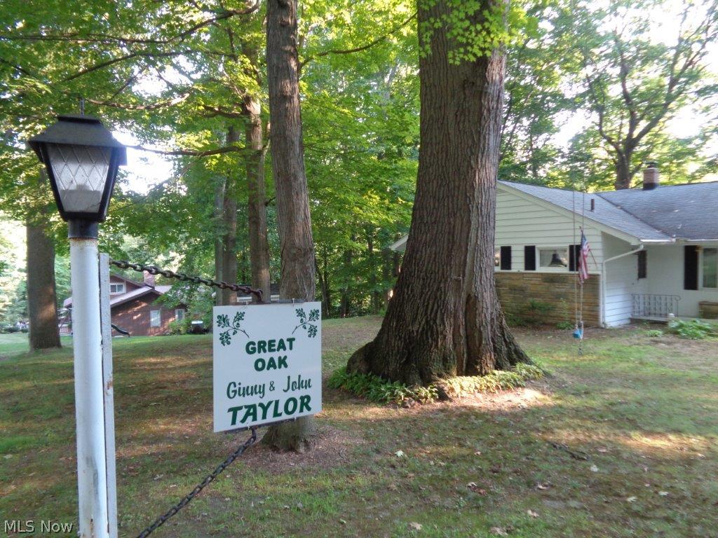 Welcome to the Great Oak location! Your family will enjoy this spacious 4 bedroom, 3 full bath ranch with complete walkout finished basement. Large living and family rooms both with stone wood-burning fireplaces. Master has own full bath, great closets, super storage areas throughout entire home. Insulated, ice guard all around, nice well-built home with beautiful woodwork and wood floors under most carpet. Attached 2.5 car garage with walkup storage, large concrete turn-around driveway. Appliances include refrigerator, stove, dishwasher, washer and dryer. Large attached breezeway. Both levels overlook the peaceful, easy-care treed backyard. Local forester states front Red Oak dates back to 1776 (tree swing included). This desired Mantua location is convenient to downtown, schools, and turnpike. Home is very comfortable and very affordable. Home Warranty provided for extra peace of mind.