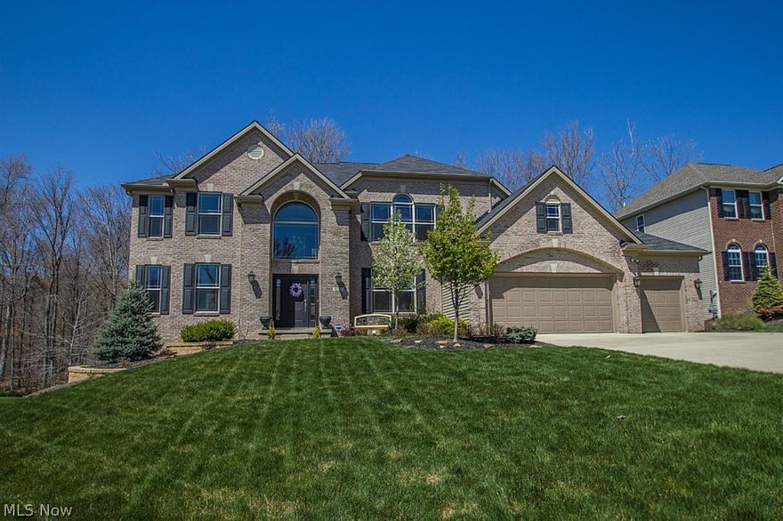 Welcome home to this stunning custom built Parkview home!  Built in 2009 this upgraded home lends itself to both formal entertaining or casual living with versatile floor plan and so many custom details.  1st floor offers formal living and dining rooms, study,  family room with gas/woodburning fireplace, chef’s delight kitchen with breakfast bar and dinette plus cheery vaulted sun room, powder room and laundry and 3 car garage.   2nd level includes glamour master suite with walk-in closet, plus 3 additional ample bedrooms with walk-in or double closets and full bath.  The living area is expanded in the spacious finished walkout lower level with rec room plumbed for bar and potential pub area and powder room. Enjoy the lifestyle both inside and out on the lower level patio or the upper level deck, both overlooking a serene, parklike wooded lot.