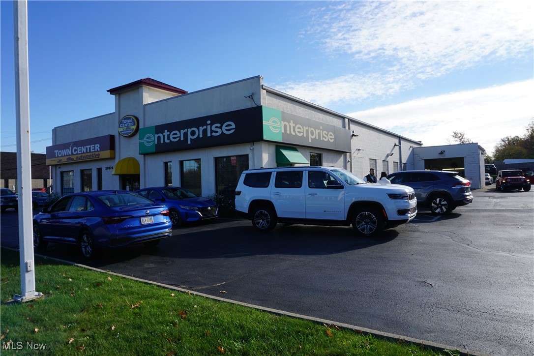 Updated versatile commercial unit in great location with high traffic on the corner of Euclid Ave and Worden Rd. The unit features a large open lobby, waiting area, and a private office. There is a shared restroom between this property and the neighboring business. The property also features a 10 Foot high heated service garage with electricity and water. The lot has 19 parking spaces with additional parking in the back. Make your business dreams a reality with a prime location.