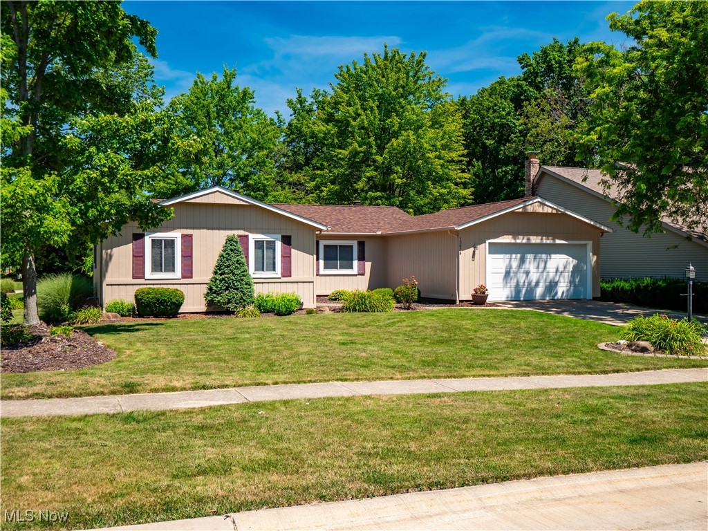 Welcome to this spacious ranch home located in one of Strongsville’s desirable neighborhoods! This well-maintained property offers one-floor living with the bonus of a partial basement featuring glass block windows for added light and security. Recent updates include a brand new roof (2025), fresh exterior paint (2023), and new laminate flooring in various areas (2024), making this home move-in ready. The kitchen is generously sized with ample counter space, a convenient breakfast bar, and all appliances included. The family room features a cozy wood-burning fireplace and a patio door that leads out to a spacious deck overlooking the peaceful backyard—complete with mature trees, an arbor for added charm, and a large storage shed. The primary suite is spacious and includes a private bathroom with a skylight that fills the space with natural light. Additional highlights include a two-car garage, washer and dryer staying, hot water tank approx 2018, and an HVAC system approximately 10 years old. While there is no HOA, the owner has the option to join the neighboring association to enjoy access to the community pool. Don’t miss this opportunity to own in such a sought-after Strongsville location—close to parks, shopping, and top-rated schools!
