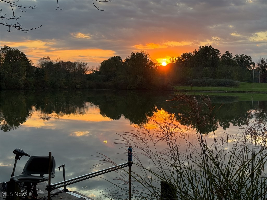 Rare opportunity to own a lakefront parcel on a private 10-acre lake in Alliance. This approximately 0.33-acre lot is cleared, build-ready, and zoned R2—suitable for single-family or duplex construction (buyer to verify with local zoning).
Situated directly on the water, the property offers peaceful lake views, gentle breezes, and a tranquil setting for a custom home or investment property. Public water and sewer are available at the street.
Located in Marlinton Local School District with convenient access to local amenities, this lot provides a unique chance to enjoy lakeside living without HOA restrictions.
