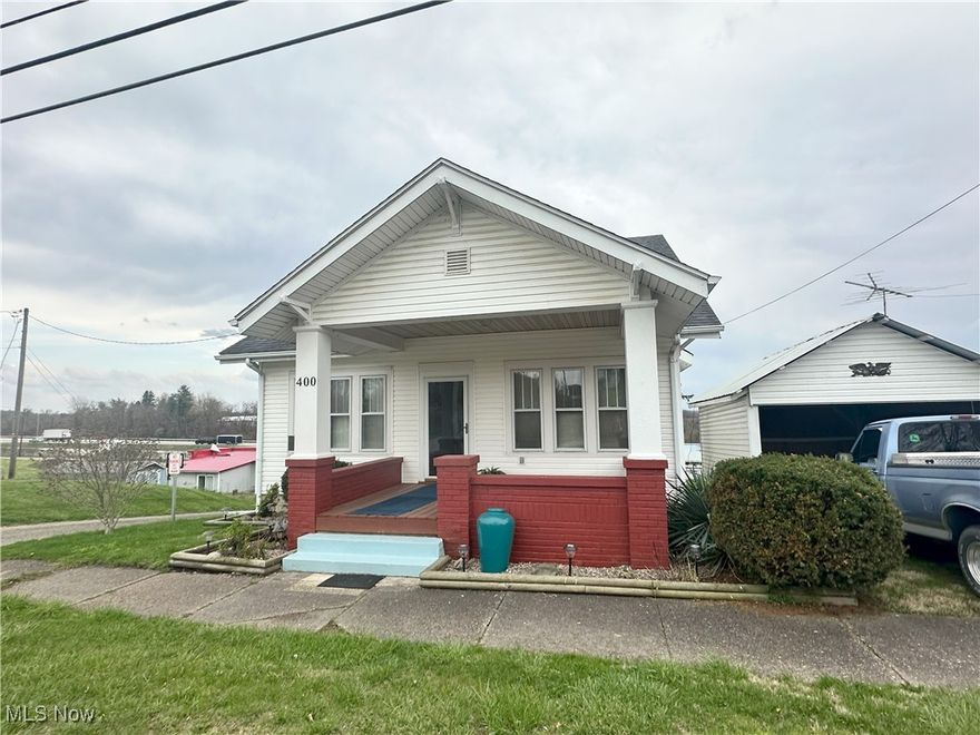 Step into the warmth and charm of this beautifully maintained 4-bedroom, 1-bath home, rich with original character and thoughtful updates. As you enter, you're immediately greeted by a beautiful fireplace that serves as a striking accent and focal point in the living room—adding charm and character, seller never used it other than for decorative purposes.
You'll love the stunning original woodwork, gleaming hardwood floors, and eye-catching built-ins throughout. The living room flows seamlessly into the dining room, where you'll find even more beautiful built-ins and a cozy window seat flanked by two storage units—perfect for reading or relaxing.
The main floor offers two bedrooms and a full bath, while the upstairs features two additional generously sized bedrooms with impressively spacious closets—rare for a home of this era. The kitchen retains its vintage charm with tall, original cabinetry that offers ample storage and style.
Mechanically, the home is in excellent shape: heated by a 12-year-old fuel oil furnace, with a new septic tank installed just 3 years ago. The roof features 3-dimensional shingles and was replaced 7 years ago, while the siding was updated with durable vinyl 10 years ago. Additional updates include a 4-year-old hot water tank and updated electrical system.
Outside, enjoy a morning coffee or evening breeze on the charming front covered porch with a new floor, or entertain guests on the back deck. Plus, city water is scheduled to be available in the area by 2026, adding even more long-term value to this already exceptional property.  A new garage door leads into the basement, providing convenient one-car parking.
This home is a rare blend of vintage beauty and modern function—don’t miss your chance to own this gem!