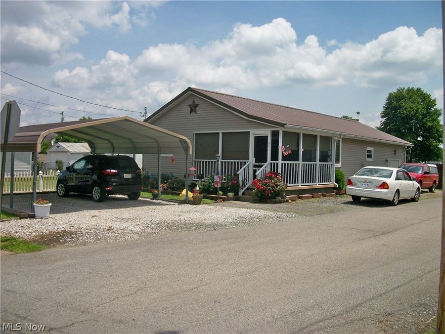 ARE YOU STARTING OUT OR SLOWING DOWN? Welcome to this charming vinyl sided one floor living ranch styled home perched on a corner lot in South Parkersburg. Relax on the accommodating enclosed front patio/porch. Walk in to a sizable living room with fireplace and nice bay window to gather with company which flows into an eat-in kitchen with complete stainless steel appliance package. Off the kitchen, step down to a laundry room with washer/dryer and large storage room. This room could be converted back to a one car garage by removing the 2-man double doors for the mechanic enthusiast. Three bedrooms with window blinds included and bathroom includes a jetted bathtub. Updates include roof (6 yrs.), AC (10 yrs.), furnace (6 yrs.), & range (4 yrs.). This is your chance to purchase adorable home.