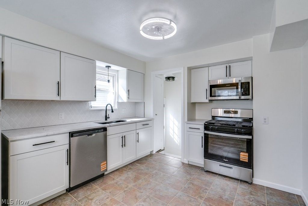 Photo of 6406 Sunderland Drive, Parma, OH 44129 (MLS # 5191886)