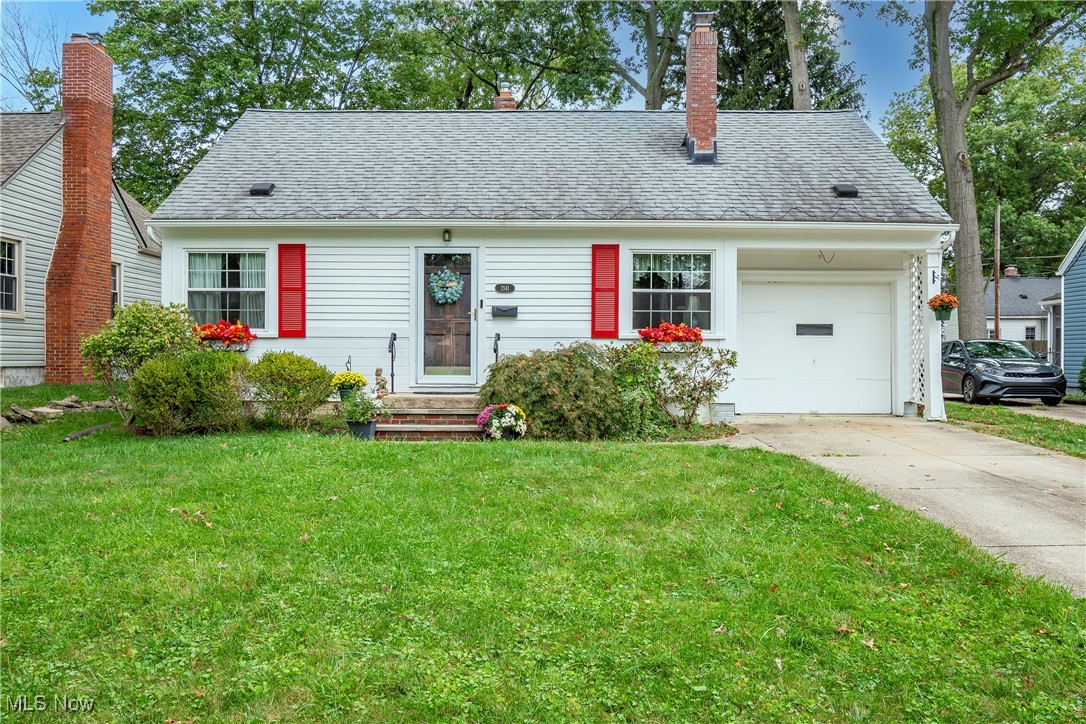 Welcome home to your cozy retreat in the heart of Cuyahoga Falls! This delightful Cape Cod features 3 bedrooms and 2 full bathrooms. Step inside to discover beautiful hardwood floors that add warmth and character. The inviting living room boasts a cozy gas fireplace, ideal for relaxing evenings. The kitchen, complete with a charming bay window, offers views of the backyard, creating a bright and cheerful space for meal prep and gatherings. Two bedrooms are conveniently located on the first floor, while the master suite is tucked away on the upper level, providing a private oasis. The lower level features a full bathroom, rec room, and a laundry area. Outside, you'll find a large, private patio for hosting summer barbecues or enjoying quiet mornings with a cup of coffee. With its prime location, you're just moments away from downtown Cuyahoga Falls, where you can explore shops, restaurants, and local attractions. Notable updates include: HWT and garbage disposal 2024, A/C 2023, furnace 2018, roof approx. 15 yrs. Don't miss your chance to call this charming Cape Cod home! 1 yr home warranty included for your peace of mind. Schedule your private showing today!