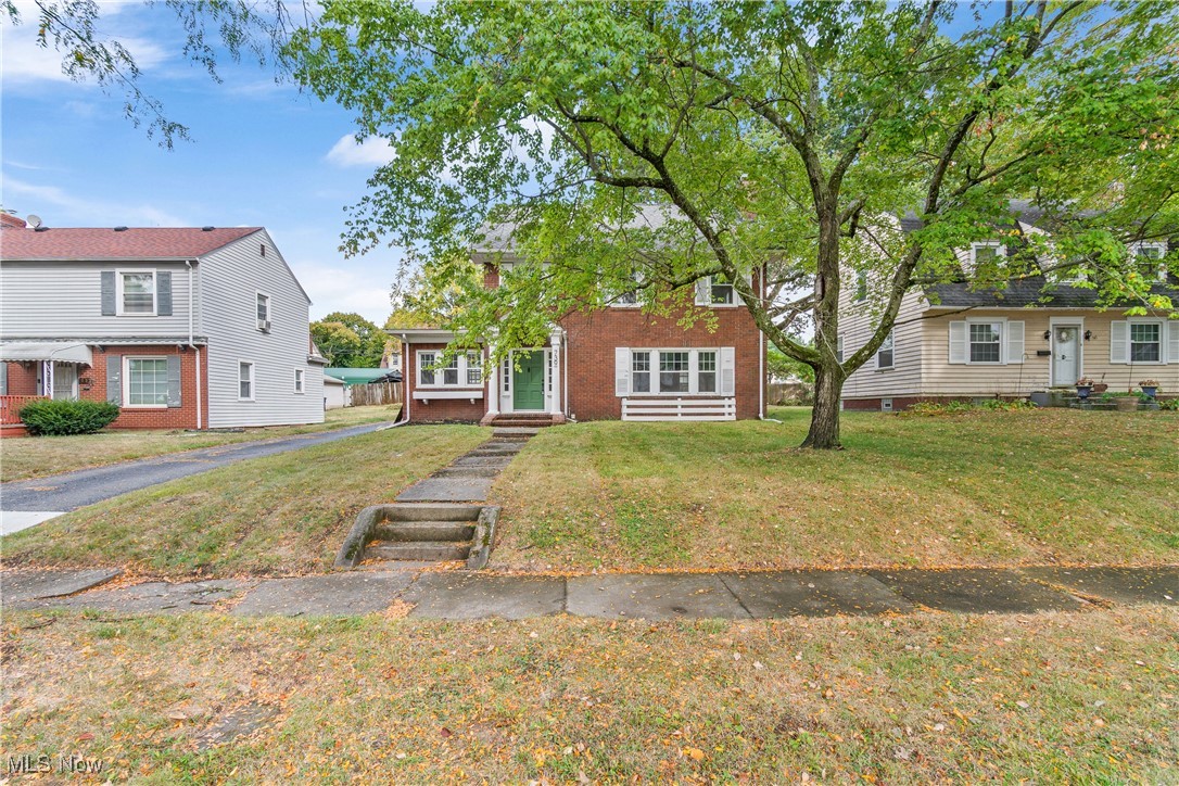 Completely renovated brick colonial blending timeless charm with modern upgrades! Boasting over 2,200 sqft, this spacious home features 3 bedrooms, a private office, a 406 sqft bonus room, 2.5 bathrooms, and a rare 3-car garage—plenty of room for the whole family. Step inside to a bright, refreshed interior showcasing luxury vinyl plank (LVP) flooring, modern black finishes, fresh paint, and new carpet throughout. The heart of the home is the stunning, fully redesigned kitchen, complete with 42” white shaker cabinets, a brand-new stainless steel appliance package, Calacatta countertops, a large single-basin undermount sink, sleek faucet, modern cabinet hardware, pantry, breakfast bar, and a cozy eat-in nook with built-in cabinetry. Adjacent to the kitchen is a spacious formal dining room, perfect for entertaining and hosting holiday gatherings. The oversized living room is a showstopper, featuring a floor-to-ceiling LED fireplace, crown molding, and abundant natural light. Need to work from home? The private office includes exterior access to the patio—a great work-from-home setup. A convenient half bath on the main floor is ideal for guests. Upstairs, the reimagined primary suite sets this home apart with his-and-hers closets, a walk-in shower, and all-new modern finishes. The refreshed basement offers even more living space, including a carpeted bonus room with egress window, recessed lighting, a laundry room with utility sink, and a storage area with new glass block windows. Additional updates include: newer windows throughout, roof less than 10 years old, new gutters (2022), brand-new water heater (2025), updated plumbing and electrical, and NEW AC (2025) - Agent Owned