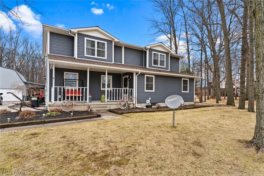 Young at Heart...Venerable design with modern features offers you graceful living in this four bedroom Colonial style home.  Welcoming front porch, inviting foyer entrance, first floor bedroom and/or office with private bath, two story great room adjacent to eat-in kitchen with center island for added counter space, french doors leads you to the four season sun room, ceramic flooring, wood burning stove keeps the home nice a cozy,  sliding door to access the private backyard, innovatively designed loft,  first floor laundry room, walk in pantry,  basement, 40 x 40 barn/garage with a heated bay, 40 x 18 covered patio,  33 foot round above ground heated pool, deck, custom tree house adds character and charm,  gutter guards,  whole house generator, electric hot water tank, over two scenic acres to roam and explore. Step back in time to step up to Quality! Don't settle for less call today.