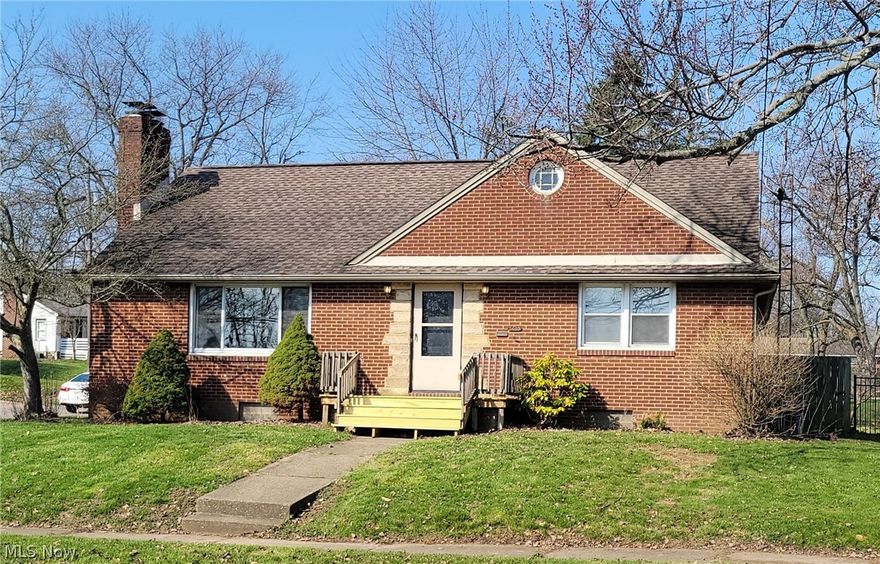 3405 Frazer Ave NWCanton, Ohio 44709; Market Heights Plain Local Schools Built in 1953, this is a 1,914 square foot, 3 bedroom, 2 bathroom, brick, move-in ready home on a corner lot. Everything has been done here. There is new LVP flooring throughout the main floor and new carpeting upstairs. The entire home has large rooms with ample storage space and has been freshly painted throughout. The main floor has two roomy bedrooms with nice sized closets and a kitchen with natural maple cabinets and Corian countertops. The spacious living room has a large picture window and a functional fireplace. There is also a bonus room with a closet that could be used for an office, a small dining room, a fourth bedroom, or could easily be converted into a first floor laundry. The main floor bathroom has a laundry chute and a walk-in shower with glass doors, and mosaic tile flooring.The spacious upstairs bedroom has new carpeting, plenty of storage space, and another full bathroom with a tub/shower combo with glass doors.The clean, glazed tile basement is large with newly painted floors, washer/dryer hookups, and a separate room that could be used as an office. There is a toilet, utility sink and another functional fireplace in the basement. Outside is a gardeners haven. There are ample raised garden beds and a large concrete patio in the back. There are newly constructed porches at the front and side doors and a storage barn. The yard is fully fenced and there is an attached 2 car garage with extra parking.