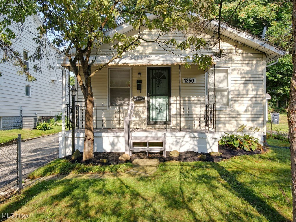 Great 2 bedroom/1 bath ranch on quiet park like setting. This home has hardwood floors, 2 large bedrooms, remodeled full bath, open kitchen with lots of storage, large, private back yard, full basement, covered back porch for relaxing, and one car garage. This home is centrally located, great layout and move-in ready!