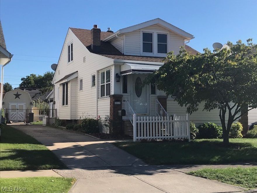 This Parma Cape is well maintained and move-in ready!  Your 3 season enclosed front porch opens into the Living Room.  A working gas fireplace with custom painted brickwork, wood built-ins and a large mantel make for a lovely focal point.  The Formal Dining Room boasts 2 built-in cabinets and bench seat.  The laminate floors flow into the updated Kitchen featuring newer Kraftmaid cabinetry with overhead lights and crown moulding.  All kitchen appliances stay!  The Two Full Baths were updated in 2020 with new vanities, new vinyl flooring and refinished tubs.  2 nicely sized Bedrooms and a linen closet complete the 1st floor.  The Master Suite upstairs features ample closet/storage space.  Possible 4th bedroom or sitting/dressing room.  All carpeting throughout the home professionally cleaned 8/2020.  The freshly painted Basement features new glass block windows and a storage room/pantry with shelving.  Basement stairs updated with new flooring.  Wait until you see the backyard: covered