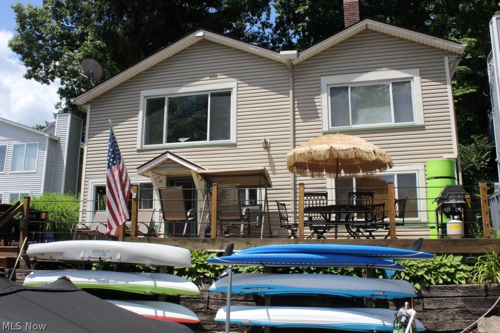 Lakefront on main chain of lakes and what a gem! Approx. 48' of lakefront with 4 bedrooms/2 baths, approx. 1689SF including finished walkout and move in condition* Updates since 2013 include kitchen with stainless appliances plus a pantry, updated windows & vinyl siding* Updates since 2015 include furnace, central air with app controlled thermostat (2016), deck (2016), vinyl plank flooring throughout first floor except bedrooms & bath; softener & well pump (2018)*
Updated concrete patio with walk way around back of home (road side)* Open floor plan with mega view of lake* Walk out lower level with rec room with access to deck, laundry, 2 bedrooms & full bath- nice entertaining area* Excellent storage area on second floor* 2 floating docks* Huge parking area- at least 9 cars (room to build a garage)* All appliances included* Approx. 8x10 shed* Home warranty provided* Immediate possession upon close*