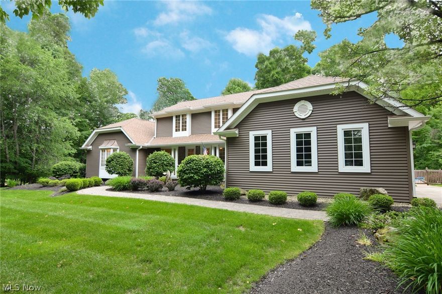 Welcome to 8245 Eagle Ridge Dr! If you're looking for a convenient location and plenty of amenities without sacrificing privacy you've come to the right place. This lot sprawls over 2 wooded acres and overlooks a beautifully maintained pond and your own private inground pool with a covered sitting area and pool house with additional shed storage. Pool liner was recently installed and patio was upgraded to poured concrete. Inside the house features an open floor plan with vaulted ceilings and floor to ceiling gas fireplace. The Master Suite has been tastefully remodeled with a new Master Bath and private balcony. First floor main bathroom includes a full bath with a walk in shower. Connecting office could also function as a 5th bedroom! The walkout lower level has also been renovated to accommodate a large entertaining space / rec. room, a second complete kitchen and a full size bar. This area also features a lower patio that connects back to the pool.  Please inquire directly for the full update / amenities list!