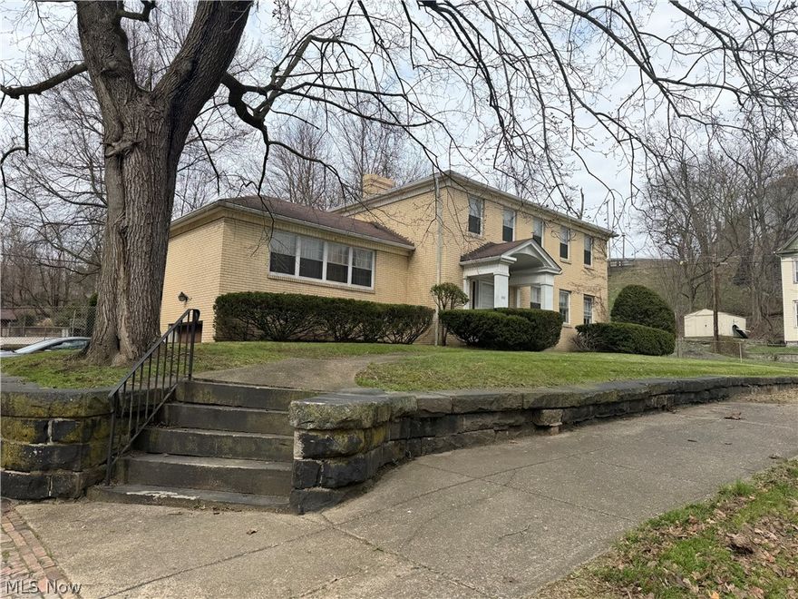 Proudly owned, this home offers a fantastic floor plan and exceptional construction. Solid brick home offering generous living room/ dining room space which includes a fireplace, a study/den that could easily serve as a 4th bedroom complete with a half bath. There is 3 large bedrooms on the 2nd floor. The primary room includes a full bath and an additional full bath serving the 2nd and 3rd bedroom.  Beautiful hardwood flooring in all 3 bedrooms and hardwood flooring beneath the carpet on the main floor ready to be revealed. This home also boasts a large fenced in backyard, a full basement, and a one car garage. This home is perfect for entertaining or everyday living. Bring your vision and transform this solid classic property into your own masterpiece.