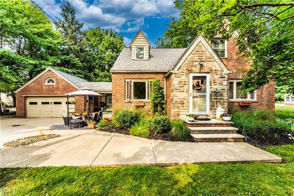 Charming Home with Big Yard & Mechanic’s Dream Outbuilding! - This updated single-family home features a new roof, windows, furnace, and central air (2014). The upstairs was converted from an attic into a finished room with drywall and carpet, adding extra living space. Enjoy an updated kitchen (2022) and a spacious yard. The highlight? A large outbuilding—perfect for mechanics, hobbyists, or extra storage! Don’t miss this unique opportunity!