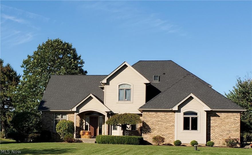 SEVERAL ROOMS HAVE BEEN FRESHLY PAINTED!  nEW ROOF!  NEW SIDING! NO MAJOR OUTSIDE EXPENDITURES FOR YEARS!                                                                                                                             
Well loved, custom built home in South Range School District on 1.7 acres.  Features include cathedral and vaulted ceilings, open oak staircase, oak doors and trim, custom window treatments, first floor laundry room, all season sun room, Jacuzzi bath in master and central vac. Enjoy dining in your eat in kitchen equipped with loads of hickory cabinets, including a roll out pantry and island.  Oversized garage houses 2 and ½ cars with a separate entrance to the basement.

Don’t miss viewing this home to appreciate the attention to quality and detail given when the owner first built their home.