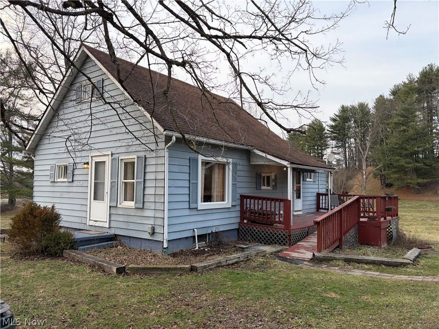 Here is your chance to own over 2 and a half acres in East Muskingum Schools. Private lot with stream running through it. Many updates already done but you have the opportunity to make it your own. Being sold AS IS.