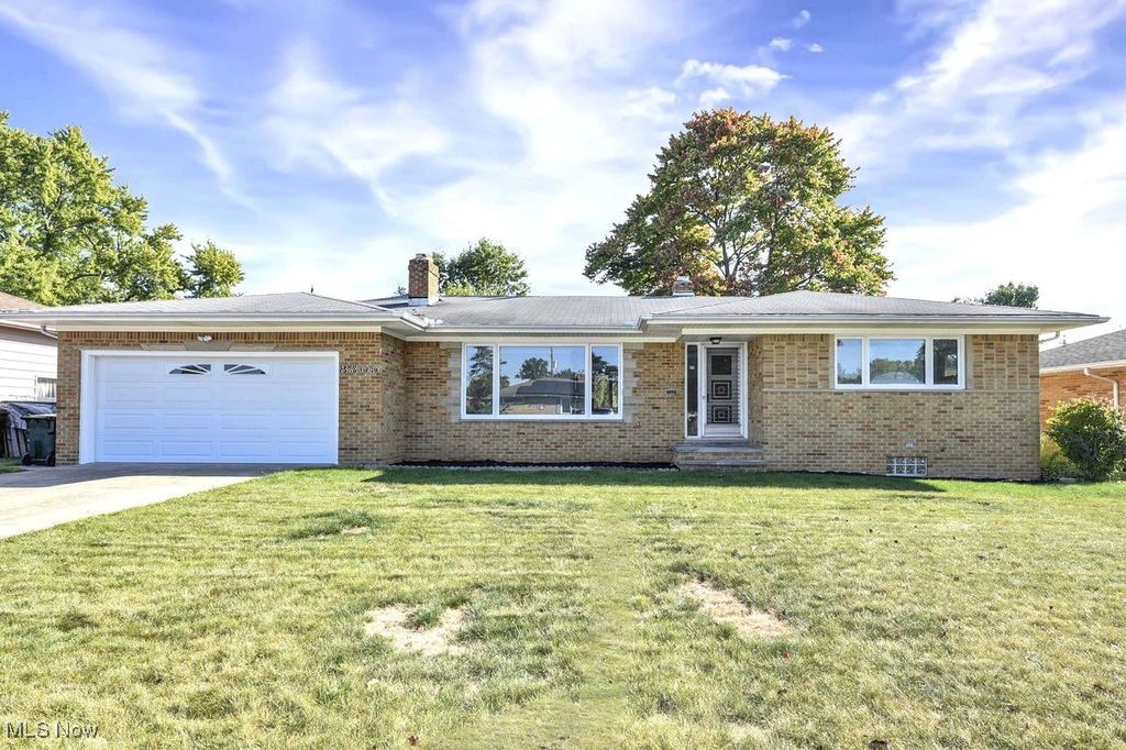 This charming solid brick ranch offers a comfortable and inviting living space with three well-sized bedrooms and one and a half bathrooms. The home features beautiful hardwood floors throughout the living room, dining room, and all three bedrooms, adding warmth and character to the space. A versatile bonus room at the back provides additional living area, perfect for a family room, home office, or playroom. Step outside to a covered concrete patio that overlooks a peaceful backyard, ideal for relaxing or entertaining guests. The full unfinished basement presents ample opportunities for storage or creating an entertainment area tailored to your needs. With a bit of cosmetic updating, this home has the potential to become a true gem, combining solid construction with classic charm in a desirable layout.
