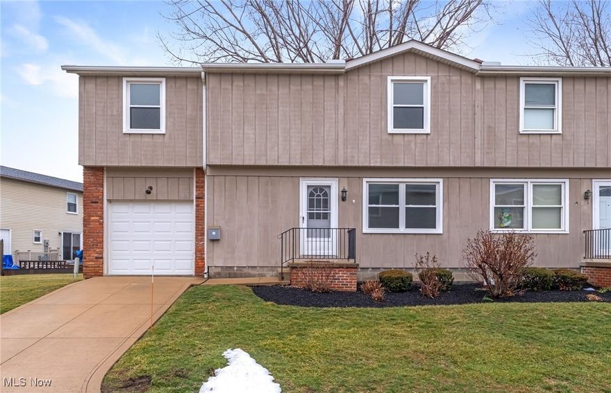 6824 Kirkwood Drive is a move-in ready, tastefully renovated end-unit condo with extensive upgrades from top to bottom. This 3-bedroom, 1.5-bathroom townhome-style unit features new luxury vinyl plank flooring, complemented by new interior doors with modern hardware, updated baseboards and casings throughout, and elegant crown molding in the living room, dining area, kitchen and all bedrooms. All of these updates, along with stylish new light fixtures, create a fresh and contemporary atmosphere throughout the home. The kitchen has been refreshed with beautifully refinished cabinets, new quartz countertops, ceramic tile backsplash and a full suite of new GE stainless steel appliances including refrigerator, range, microwave and dishwasher. All three bedrooms, located on the second floor, are spacious with two of them featuring walk-in closets. Both the main and second-floor bathrooms have been renovated, and the finished basement opens up to a large recreation room perfect for family gatherings. The basement utility room provides storage space and is equipped with an LG washer and dryer. Additional features include an HVAC system that is just two years old and Polaris vinyl windows with a transferable limited lifetime warranty, also just two years old, and a recently updated electrical box, ensuring safety and efficiency. Enjoy outdoor living on the composite deck off the back of the home, ideal for relaxation or outdoor entertaining. All this and more, this unit is nestled within the Bellflower Terrace Condominiums complex, which handles exterior maintenance, landscaping, snow removal and trash pickup. This meticulously updated end unit with single-car attached garage combines modern comfort, quality craftsmanship, and low-maintenance living, in a convenient Mentor location making it a must-see for potential homeowners!