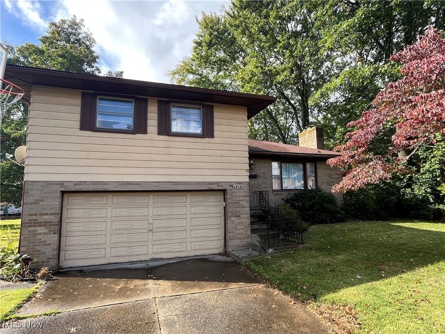 Welcome home to 1854 Eldridge Ave! This charming four level split home has space for everyone. Located at the very end of a dead end street with a nice size oversize lot this home has the privacy you are looking for! Beautiful hardwood floors welcome you into the large living room and run throughout the upper bedroom level as well. The main bath has been updated with a newer vanity and ceramic tile flooring. The lower level has updated laminate flooring, a half bath and includes a walkout to a covered patio overlooking the ample back yard! The finished space in the basement level is perfect for a bonus area to gather watch TV and includes a potential fourth bedroom/office. This home is ready for a new owner and is move in ready! Please schedule your showing today!