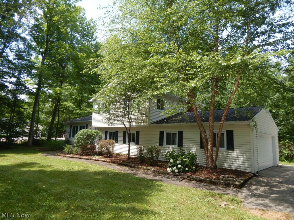 Space and Sunshine for the nature lover in you! Beautiful private 1.6 Acre lot on Cul-de-sac featuring spacious 3 or 4 Bedroom 4 level split.
Your sure to be pleased with the total updated interior featuring new hickory kitchen, freshly painted interior and exceptional four season addition
overlooking rear back yard. Newer baths, freshly painted interior, all new floor coverings throughout.
Near parks and schools. Don't miss the comfort of this energy efficient home with public sewer and well water.
A true private rear yard with space for the growing family.
