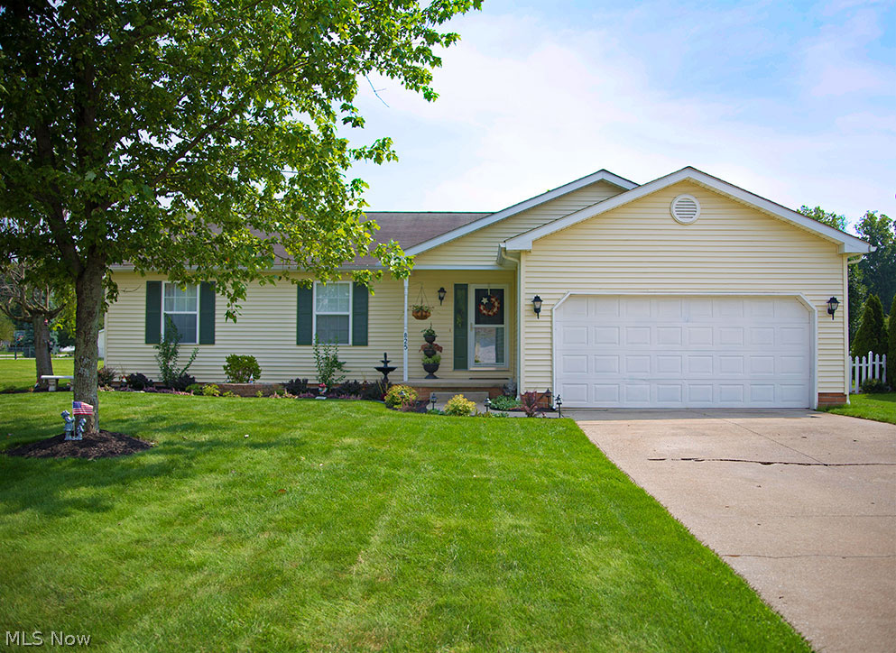 Move right into this beautiful 3 bedroom, 2 full bath ranch with 1,524 square feet! The house boasts abundant natural light, hardwood floors, and updates throughout. The kitchen is large, bright and airy, with hardwood floors, stainless steel appliances that stay and updated kitchen cabinets. Beautiful hardwood runs through all of the other rooms, including the large family room and inviting foyer. Each bedroom features an oversized closet. Bedrooms are large with ample light. The dining area leads to the private backyard patio and eating area through two sliding patio doors. The back yard is fully enclosed by a vinyl fence. Updates include: hot water tank in 2013, ac in 2013, custom built patio in 2014, new fixtures and cosmetics throughout the whole home. HOME WARRANTY INCLUDED! Stop by today to see this beautiful single floor home in Ravenna.