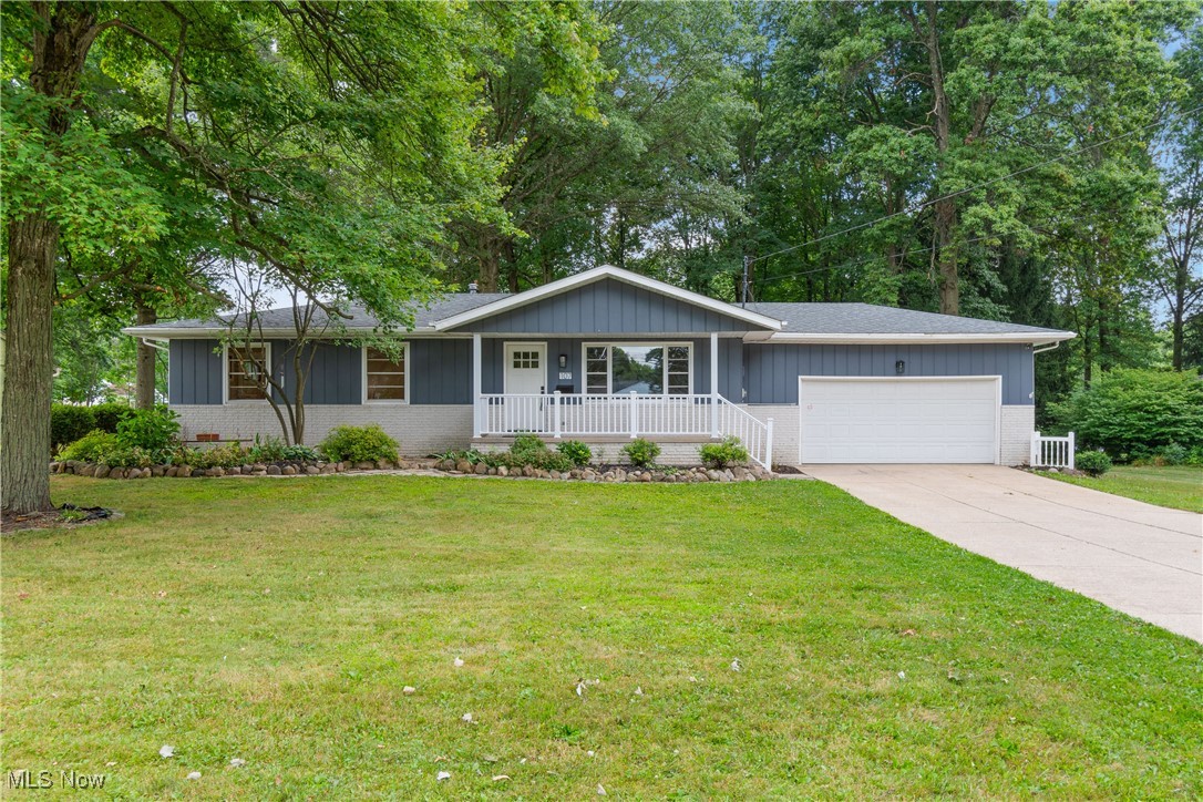 Welcome to this completely renovated ranch in Tallmadge, offering style, comfort, and convenience! Bright and airy, the home features hardwood floors throughout the main level and a welcoming covered front porch.
The spacious living room showcases a large picture window, allowing abundant natural light to pour through.
Step into the real showstopper of this home - the beautifully updated, gourmet kitchen! Prepare culinary delights in this stunning space which boasts soft-close cabinets, quartz countertops, tile backsplash, stainless steel appliances, and a dining area.
A sunroom with panoramic yard views leads to the deck, perfect for entertaining.
Retreat to the primary suite, which includes an elegant, ensuite bathroom with a surround-tile shower.
Two additional bedrooms with hardwood floors and a large, full bathroom complete the main level.
Prepare to be impressed with a finished basement, offering 542 square feet of versatile living space – use the 2 huge rooms for a family/playroom, a potential 4th bedroom (as they are currently set), or an exercise space!
Outdoors, enjoy the deck and patio, which overlook the fenced .49-acre yard with mature trees a firepit, and a shed.
An attached, 2-car garage provides convenience with ample storage space and available 220 V (separate subpanel).
Located in the Tallmadge school district, this home combines modern updates with an ideal location.
Major updates include a brand-new refrigerator, dishwasher, stove, and air conditioner, and the other mechanicals are all less than 5 years old – all you have to do is move right in and unpack your bags!
Designed for today’s lifestyle, this home is truly a must-see!