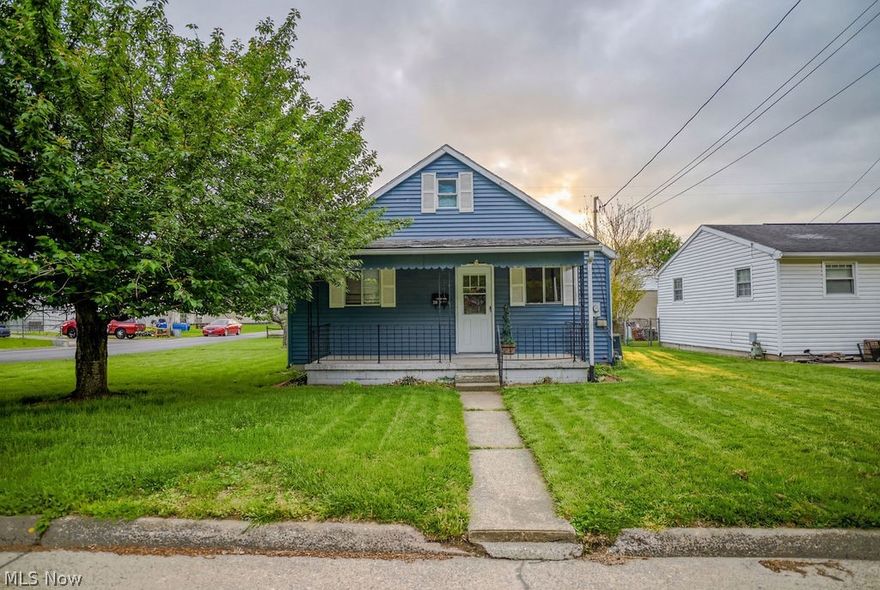Front porch mornings, backyard evenings, and a layout that simply makes sense. This home welcomes you with a covered front porch that stretches nearly the entire width, creating a natural place to pause, visit, and enjoy the setting before heading inside.

The living room is spacious and bright, featuring built ins tucked beneath the staircase that add both character and smart storage. From here, the flow gives you options. Continue to the hallway which leads you to the full bathroom then to the main level bedroom. Turn toward the back of the home and you will find a large kitchen and dining area designed for gathering, with a nearby utility style closet with laundry also conveniently located on this floor for easy day to day living.

Just beyond the dining space and kitchen, a covered back porch spans nearly the full length of the home and overlooks an expansive, level corner lot. The backyard offers room to spread out, garden, play, or create the outdoor space you have always wanted. A block outbuilding with electric provides flexibility for projects or hobbies, and an additional storage shed adds even more function.

Upstairs, a landing with storage leads to two versatile rooms. One includes rods already in place along both sides, while the other is currently used as a game and media space.

The location adds another layer of convenience, placing you just minutes from Grand Central Mall, a variety of dining options, and everyday essentials with the comfort of  a place to truly settle in.

With a newer roof, newer HVAC system, and a dishwasher only a couple of years old, this property blends thoughtful updates, practical layout, and indoor outdoor living in a way that feels easy from the moment you arrive.