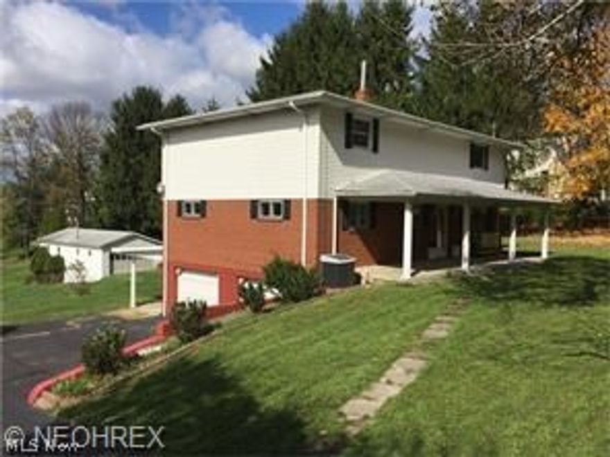 Your little round toes will love our HUGE square feet! Room to spread out in this large 5 bedroom 3 bath home! Front porch sittin' at its finest; this home boasts a relaxing atmosphere and beautiful appointments for a complimentary blend of full functionality and delightful living space! Entering the elegant living room you'll be greeted with plush carpeting and open space to the eat in kitchen area. Cook up a fabulous meal in this country kitchen with plenty of counter space and two pantry areas adjoining. Located on this floor are 2 bedrooms and a full bath area. Head downstairs and be greeted by another full bath, along with large recreation room with charming vinyl wood flooring. Adjacent is access to the spacious two car attached garage. Plenty of storage space for the lawnmower too! 

Head upstairs and discover 3 more bedrooms and yet another full bath; including the incredibly HUGE! master bedroom area; with plenty of walk-in closet space. Head back through the kitchen and gra