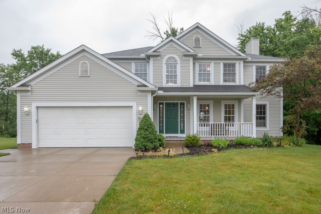 A wonderful Streetsboro colonial in the prestigious Hannum Xing, this 4 bedroom 2.5 bath colonial sits on over a 1/2 acre private lot. With over 2300 sq ft, plus the basement is partially finished with painted walls and carpet, this spacious home has plenty of room to grow. The large great room features a fireplace, and opens to the private office. A large eat-in kitchen has an island, natural wood floors, and beautiful stainless steel appliances. An exquisite 2 story foyer has the same natural wood floors. There is also formal dining. Each of the bedrooms is spacious, with large closets. The master suite has a huge walk in closet, shower and garden tub, and double sinks. A first floor laundry, large deck, front porch, and so much more.