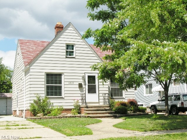 Completely remodeled! Great location. NEW kitchen, 2 full baths, furnace & air, H2O tank. Spacious rec rm w/overhead canister lighting. Carpet, paint, lighting fixtures, garage door & landscaping. Please, take a look, you might like it.