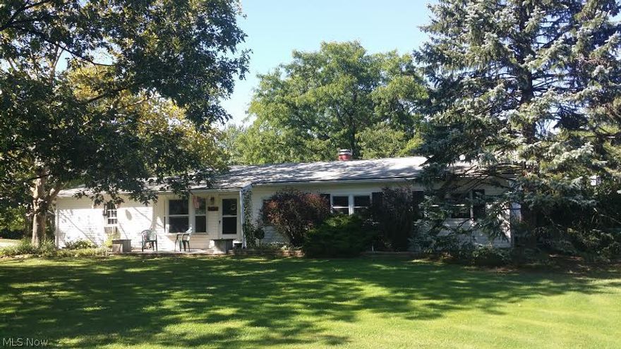 One floor living at it’s best! Enjoy this unique open floor plan of this 3 bedroom Ranch home on a large lot. Very open floor plan from the beamed ceilings in living room that opens up to the spacious kitchen and the sun room that opens to the eat-in kitchen! Gas fireplace/stove in family room! Heated garage with work bench!  Large driveway for extra vehicles! Fenced back yard with gas grill and storage! One year home warranty provided!