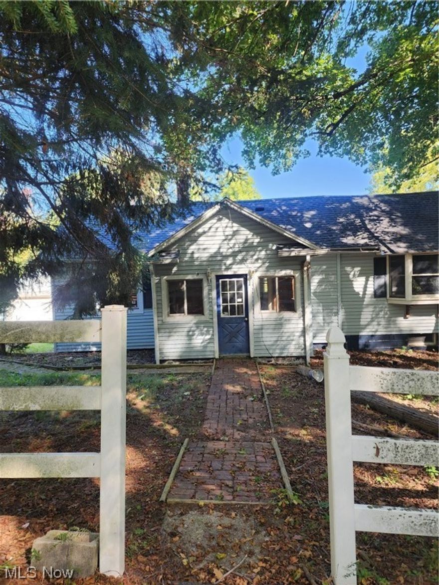 Ranch home with 3 bedrooms and 1 full bath sits on 1.14 Acre on a quiet street. 2 car detached garage, enclosed porch. Property sold as is. No guarantees. No warranties. Must be pre-approved or show proof of funds.