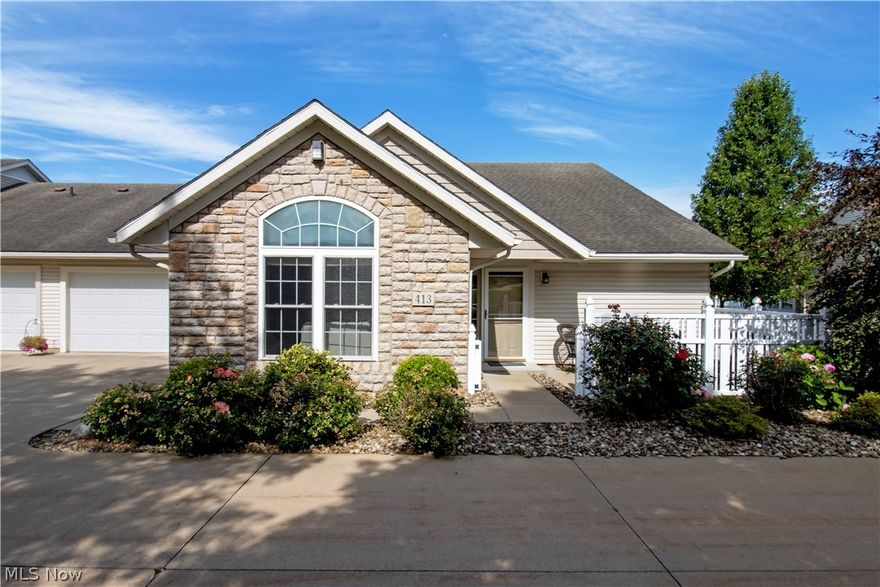 Welcome to The Groves: a friendly condo community. Step into this beautiful Weaver Baycrest build where you'll find an inviting open floor plan with a bright great room featuring new carpeting and a cozy gas log fireplace complete with stacked stone and a decorative mantle. Enjoy the convenience of a custom built-in cabinet in the formal dining room and a galley kitchen with a large solid stone granite breakfast bar, seating for 4, and a spacious pantry. The relaxing master suite boasts a walk-in closet and an updated double vanity with a stone countertop. The second bedroom features cathedral ceilings and a nearby updated full bathroom. Outside, the gated patio provides a peaceful retreat and a secure area for pets, and the two-car garage complete with pull-down attic stairs offers ample storage. Community amenities include a recreational clubhouse with an exercise room. This turnkey home has it all!  Don't miss an opportunity to see it.