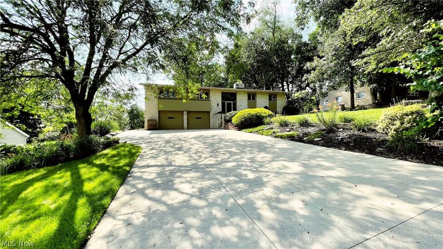 A Stunning Rare Find! Have a look at this meticulously Loved home. With tons of updates throughout! Every once in a while a home becomes available exactly where happiness meets comfort.  This lake community that feels just right as you turn on to the street you begin to smile. All your Stress is about to melt away as you pull into your Private paradise Driveway, with plenty of parking and extended cement.  This lovely Home is beautifully landscaped and is ready to Welcome you.  New flooring, paint and open kitchen concept complete with coffee nook,  easily will please the cook in your family. Plenty of counters and cabinet space. Stunning newer windows.Huge great room with natural light that comes in from every angle. The massive trex deck on the main floor overlooking the private back yard is great for entertaining.  The large 3 bedrooms, tons of closet space, and private master bathroom with dual sinks and large counter space is sure to please anyone. Downstairs gorgeous is finished