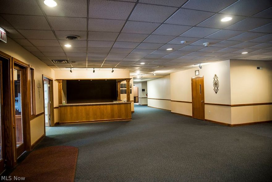 3 parcels totaling just under 8 acres. 20,180 sq ft building. Pavilion and baseball field. formerly a church.