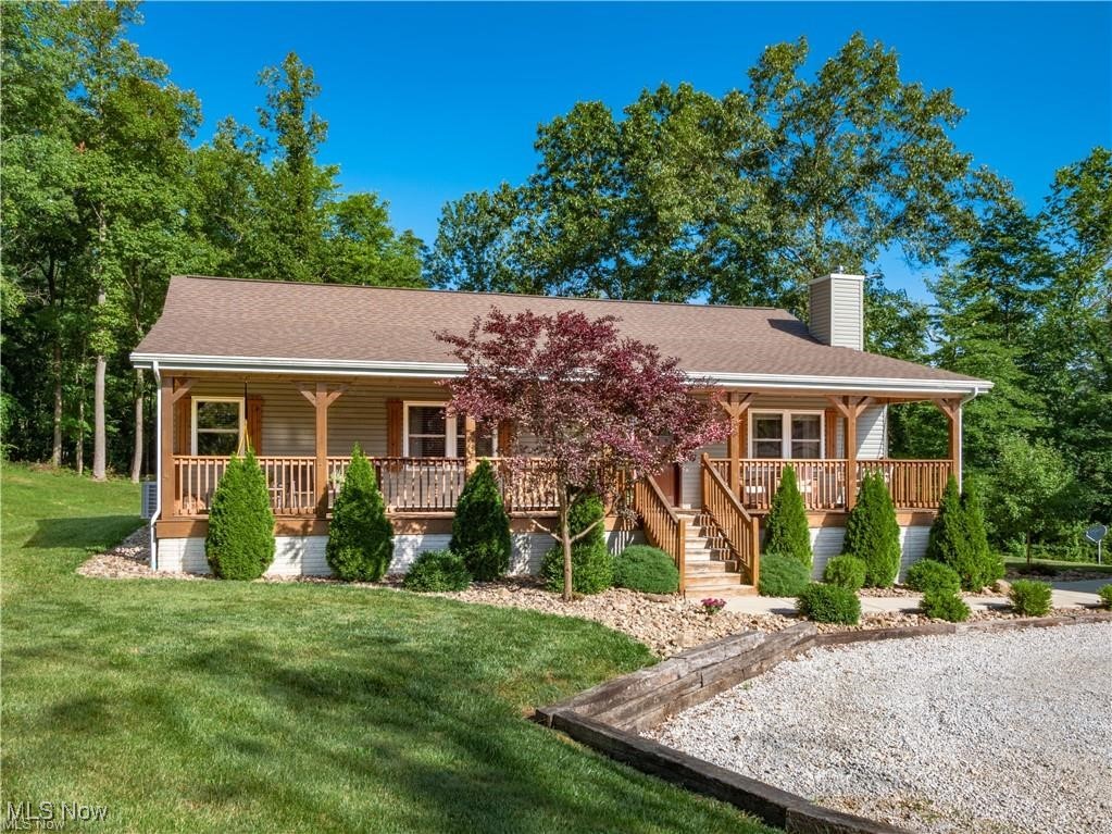 Welcome to your private retreat on 18 picturesque acres in the desirable East Muskingum School District.
This charming ranch-style home offers serene, wooded views from the spacious covered front porch—perfect for relaxing and enjoying nature. Inside, you’ll find an open-concept layout featuring 3 bedrooms and 3 full bathrooms, along with the potential to add two additional bedrooms in the basement. The beautifully designed kitchen comes fully equipped and includes a cozy coffee bar to start your mornings off right. Convenient first-floor laundry adds to the home’s functionality. The partially finished basement offers additional living space and endless potential. Outside, you’ll appreciate the oversized 3-car detached garage, along with an additional outbuilding for storage or hobbies. With plenty of trails, apple trees, and abundant wildlife, this property is a hunter’s paradise. Public water is available at the home for added convenience. More than just a home—this property offers a peaceful lifestyle where comfort meets the great outdoors!