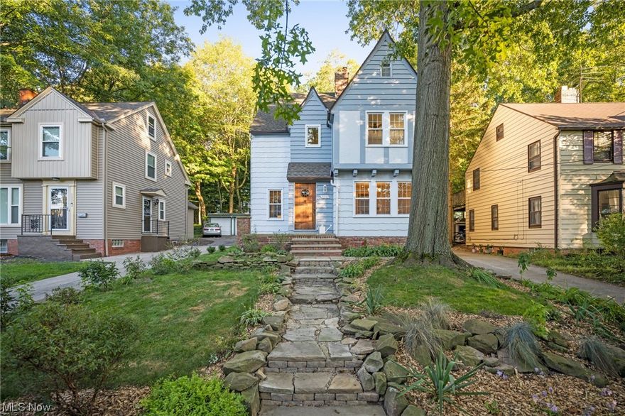 Welcome to this exquisite colonial and Tudor-style house that effortlessly blends traditional elegance with modern amenities. As you step inside, you'll immediately notice the light and airy ambiance, accentuated by the original hardwood floors that grace the main living spaces. The heart of this home is the updated eat-in kitchen, featuring newer appliances and plenty of space for culinary endeavors. New energy-efficient windows throughout the house flood each room with natural light, creating a welcoming atmosphere. On the third floor, you'll discover a spacious teen suite complete with a full bathroom and a brand-new skylight, offering privacy and versatility for your family's needs. Inside, the interior walls have been freshly painted, providing a clean and inviting canvas for your personal touch. The landscaping is truly unique, adding character to the property. This home boasts 2 full bathrooms and 1 half bathroom on the ground floor for added convenience. The living room features original French doors that open into a newly carpeted sunroom, creating a seamless connection between indoor and outdoor living spaces. Newly installed glass block windows in the basement, providing both brightness & security. Dehumidifier stays! Exterior has been lovingly landscaped and freshly painted, enhancing the curb appeal. This colonial and Tudor-style house is a true gem, offering traditional charm and modern comfort. Don't miss the chance to make it your own! Point of Sale compliant!