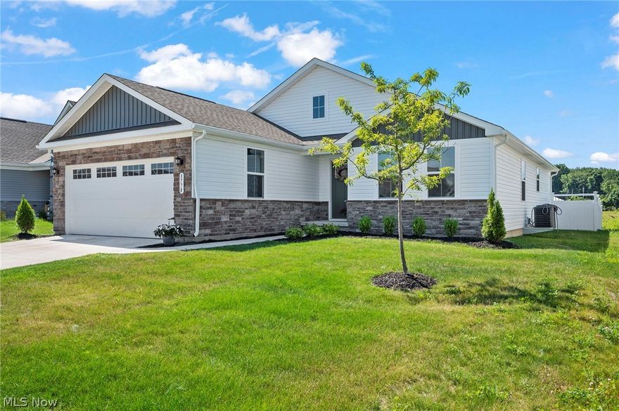 Welcome to this extra spacious, craftsman style, and beautifully upgraded ranch home that is located in the Hidden Village community in Perry and has a newly installed privacy fence and professionally finished basement with full bath. This move-in ready home features an open floorplan with a great layout with around 2,995 of living sq ft, 4 bedrooms, plus a home office, 3 full baths, and an upgraded eat-in kitchen with quartz counter-tops, stainless steel appliances, center island, and tiled backsplash. The dining area has access to the backyard, there is a 1st floor laundry room, and attached 2-car garage. The owners' suite has a walk-in closet and an en-suite bath with double vanity and Roman walk-in shower with a sitting bench. The recently finished lower level offers lots of additional living space as it has the recreation area, bedroom with egress window, full bath, exercise room and a built-in beverage area. Conveniently located near I-90, Route 2, and within the Perry School District. There were many upgrades completed during construction and many more after owner moved in. The following was recently UPGRADED : added a vinyl white privacy fence, finished the basement, upgraded light fixtures, added backsplash in kitchen, and installed electric fireplace with design feature. INCLUDED are ALL kitchen appliances. This home is a must see!