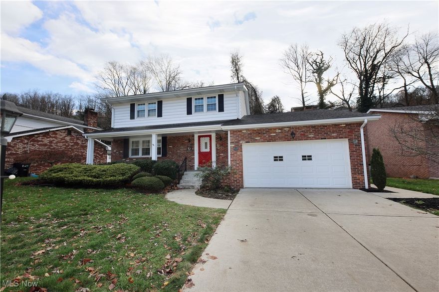 The holidays are coming! Have all the room you'll need to celebrate with family and friends in this lovely 3BR, 2.5 BA, 2 story home located in Country Club Estates, Weirton. Be greeted in the spacious foyer leading to the large living room with decorative fireplace, formal dining and eat in kitchen with island. Just off the living room step down to the family room with hardwood flooring featuring a gas log fireplace and access to the 2 car garage. On the second level you will find the very generously sized primary bedroom with a large cedar closet, extra closet space and private bath. Completing the second level are the 2 other generously sized bedrooms and full bath with double sinks. Need more storage? The full basement with workshop space is a blank slate to make all your storage issues a thing of the past. The covered front and back porches are an added plus to this wonderful home.  
Don't waste time to call to see this home before it's gone!