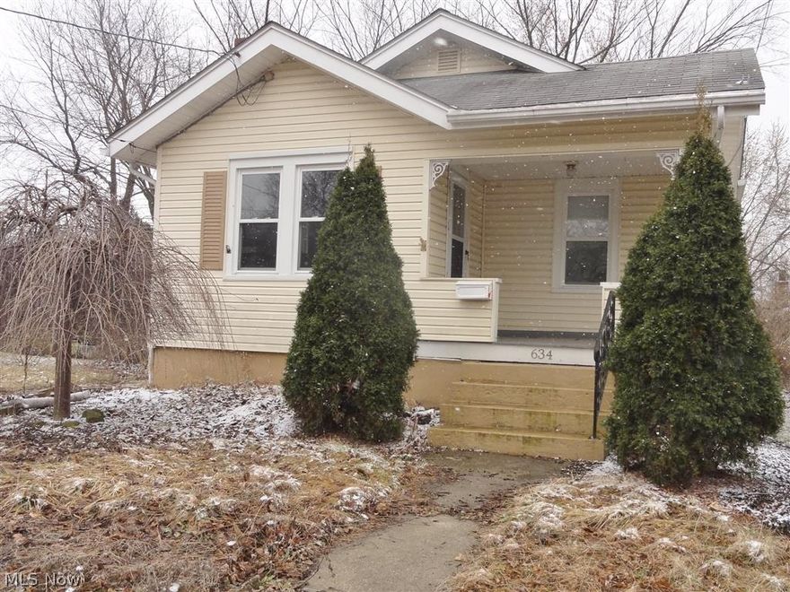 Ranch home. Ideal for starter home or rental. Faux fireplace in living room. Oak kitchen cabinets. Remodeled bath. Basement has rooms for storage and is a walk out. Covered front porch.