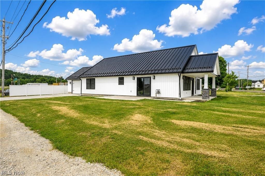 Photo of 1545 Roanoke Avenue, Uhrichsville, OH 44683 (MLS # 5223141)