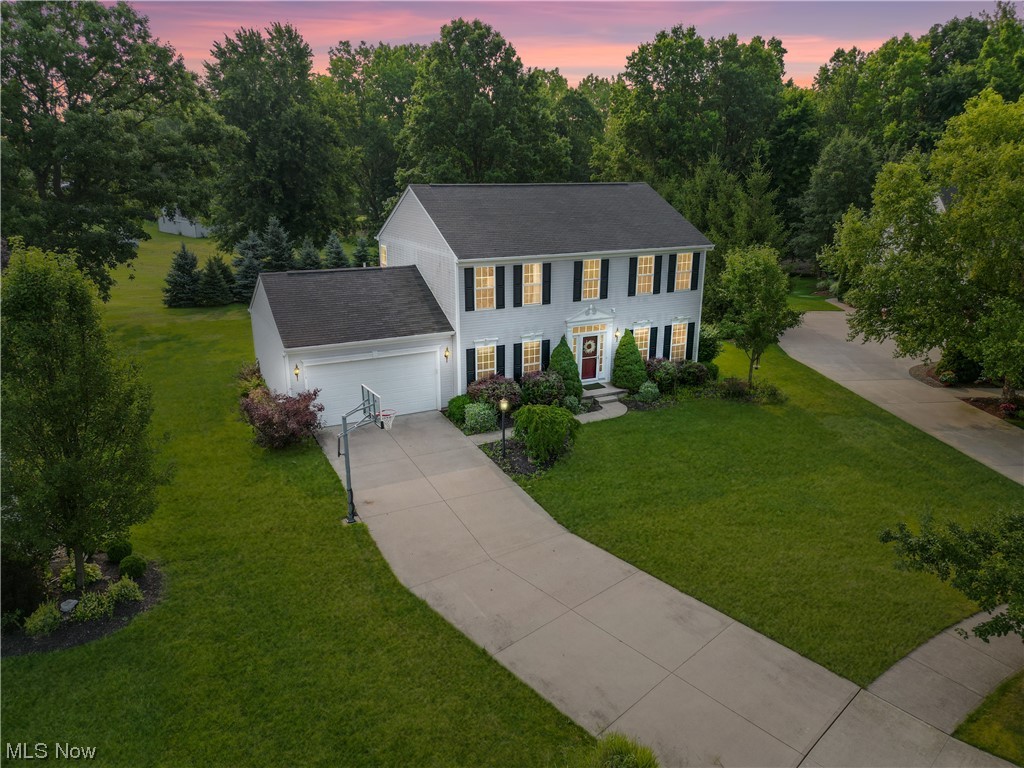Welcome to 9293 Stonebriar Ln in the highly desirable Stonebriar development in North Ridgeville close to highway access. This 4 bedroom, 2.5 bathroom home with basement sits on a cul-de-sac and features a large deck that is great for entertainment and relaxation. Head in through the front door and notice the 2 story foyer that leads to the formal dining room and front sitting room. This opens up to the great room that has plenty of windows that allow natural light in. The large eat-in kitchen which features an island includes all appliances and has a stone backsplash and plenty of cabinet space. There is a breakfast bar that opens to the sunroom that was being used as an additional dining space. This leads to the deck and beautiful backyard which also includes the swing set. Head upstairs to the 2nd floor and notice the 4 bedrooms and full bath including the owners suite that has plenty of closet space and on suite bathroom. The basement has plenty of storage space and is the same foo