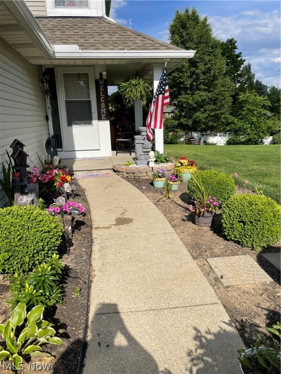 A remarkable Wrens Crossings Townhouse with 2 bedrooms, 1 full, and 2 half baths. This end unit features an awesome side porch, and a private deck, with both overlooking a peaceful pond. The open concept has open staircases highlighting the large living room and kitchen. A finished basement is a family room/rec room, 1/2 bath, and laundry room. The large bedrooms are upstairs with the full bath. An attached garage, ample parking, easy access green space, and so much more.
