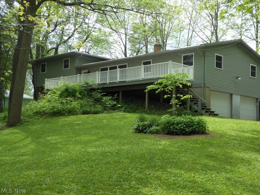 Spacious family home with room to grow. Private treed lot home set well off the street. Large decks on frond and back. Large Living Room and Dining Room on main level. Replacement French Doors to spacious rear deck. Hardwood floors under the main floor and bedroom carpets. Bonus room on Main floor is ready for final finish. Needs flooring and paint. Private entry. 22'x21.5'. Perfect for an office, craft room, additional living space. Three bedrooms and full bath on upper level. Lower level Family Room with fireplace and wood burning stove insert. 9x13 unfinished space on Family Room level could be finished as a Laundry area. Partially finished full bath. Has shower, commode and vanity. Additional storage space a few steps down has utility sink and current laundry facility. Seller has replaced Siding, Windows, Roof, Exterior Doors, Water Softener, Newer Decks and Furnace in 2000. Immediate possession.