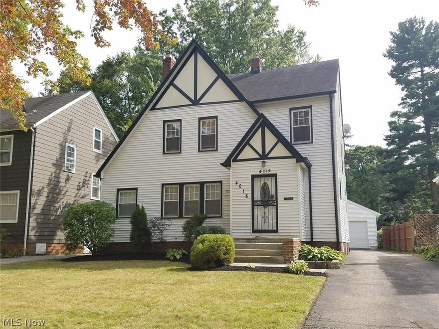 Welcome to this updated 3/4 bedroom, 1.5 bath Cleveland Heights Colonial! This home boasts an open floor plan where the interior has been freshly painted and the carpets professionally cleaned with newer windows throughout. The eat-in kitchen features rich wood cabinets, recessed lighting, and neutral ceramic tile flooring.  The formal dining room has lots of windows for a bright airy feel and doors that open up to the patio leading to the private back yard. There is also a newer 2 car garage. The spacious living room has a fireplace and bonus room that can be used as an office or play room. The second floor has three large bedrooms and an updated bath. Fully finished 3rd floor can be used as a fourth bedroom and the finished basement adds to the living space of this fabulous home. Schedule your showing today!