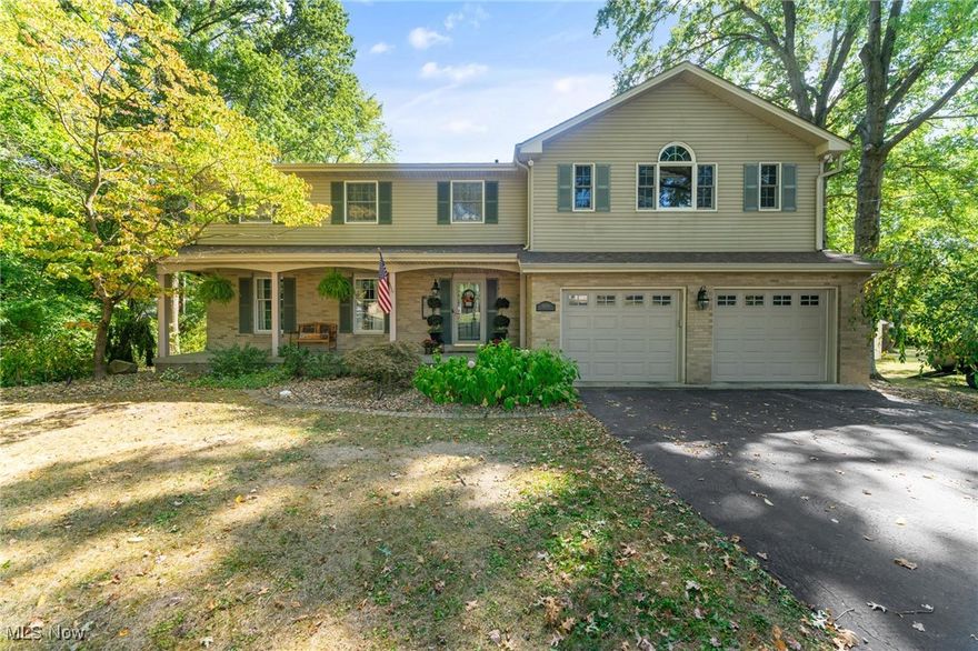 Stunningly upgraded 4-bedroom, 4-bath home in the sought-after Hubbard School District, this residence delivers both luxury and comfort from top to bottom. The completely remodeled kitchen features white wood soft-close cabinetry, quartz countertops, a subway tile backsplash, farmhouse sink, stainless appliances, a wine cooler, and dedicated coffee bar, plus a breakfast bar and sitting area—all anchored by durable vinyl plank flooring. Flowing from the eat-in area into the family room, you’ll find a cozy gas fireplace surrounded by built-ins, with seamless access to an enclosed back porch boasting a vaulted ship-lap ceiling, and out to a deck and expansive stone patio overlooking a private backyard. Upstairs offer dual primary suites: one with vaulted ceilings, a loft-like living/office area, dual walk-in closets (one cedar lined), and a spa bath with Jacuzzi tub and walk-in shower; the other with its own full bath, walk-in shower, and generous closet. Two additional bedrooms provide plenty of space and closet storage. The finished basement is ideal for entertaining, featuring a wet bar with dishwasher, living area, hidden wine cellar, and ample storage—including near the laundry area with two sump pumps. High efficiency systems include two furnaces, central air conditioning, tankless hot water, whole-house filtration, plus an attached 2-car garage with insulated doors and a separate 2-car garage in the back. 200-amp panel with a 100-sub panel. Exterior updates such as vinyl siding and dimensional shingle roof round out this incredible package. A truly exceptional home that combines elegant finishes, thoughtful layout, and premium amenities. Schedule a showing today!!