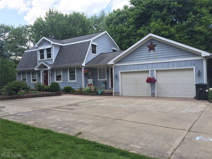 Custom built, beautiful Cape Cod features, 4 bedrooms with one on the first floor and 2 full baths. Two story foyer, hard wood floors, custom crafted woodwork and crown moldings. Over 2300 sq. feet of living space, eat in kitchen with maple cabinets and kitchen appliances, refrigerator, oven, range, dishwasher and microwave stay. Formal dining room and living room with gas fireplace.  Laundry room on main level, 2.5 attached garage, full basement, furnace replaced in 08, private patio and shed. Call to view this unique home in Howland LSD.